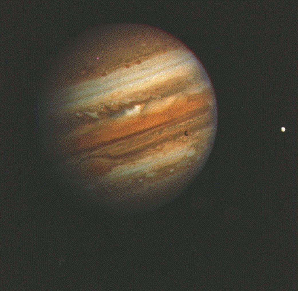 Imagem do planeta Júpiter, de tons rochosos laranjas.