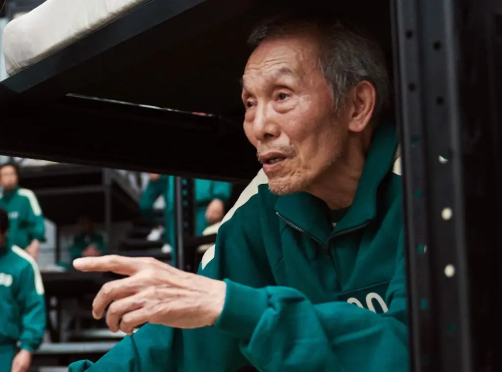 Oh Yeong-su durante cena da série Round 6.