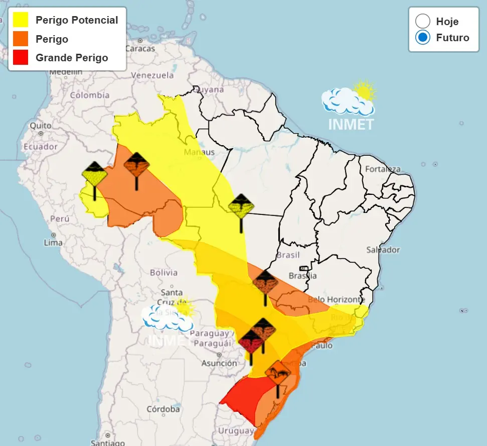 Mapa do Brasil com alertas meteorológicos do Inmet destacados por cores. Áreas em amarelo indicam “perigo potencial”, regiões em laranja representam “perigo” e zonas marcadas em vermelho mostram “grande perigo”. Os avisos se concentram do Norte ao Sul do país, especialmente no Centro-Oeste, Sudeste e Sul, com ícones de tempestade posicionados sobre os estados afetados. No canto superior direito, há uma legenda com as opções “Hoje” e “Futuro”, e o logotipo do Inmet aparece sobre o oceano.