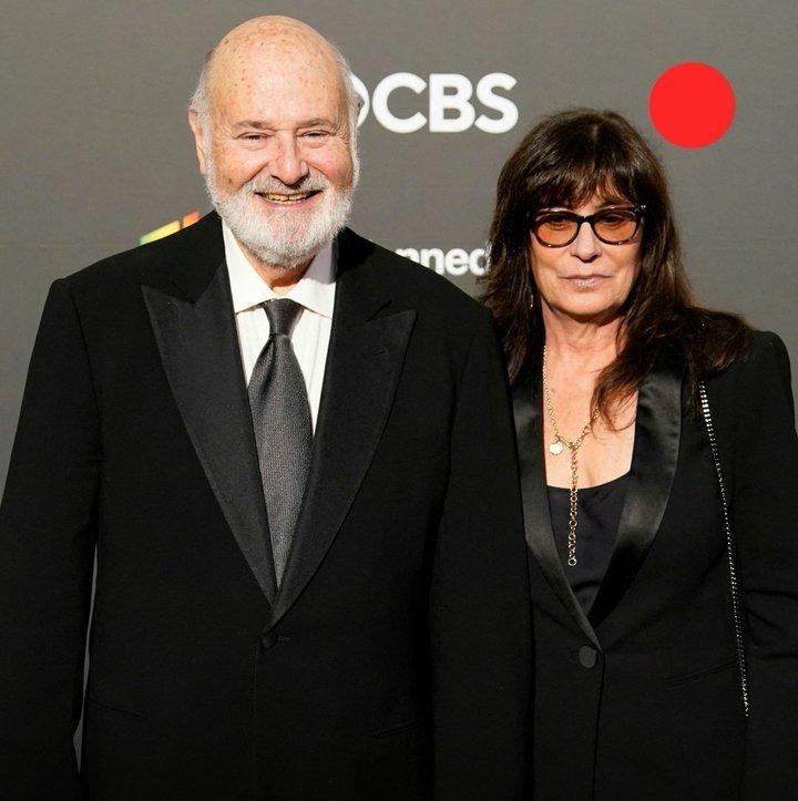 Rob e a esposa Michele durante um evento.