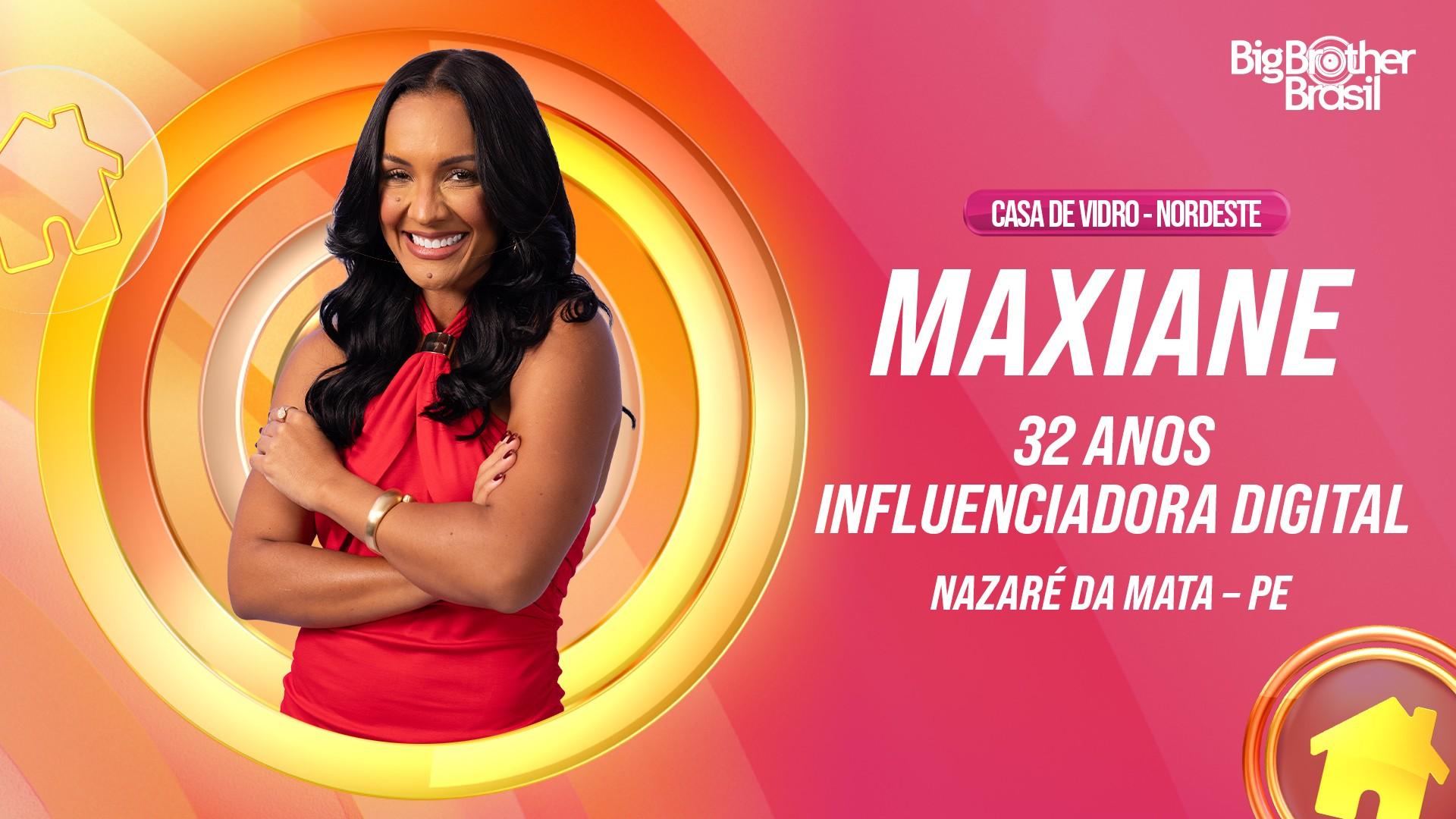 Maxiane, participante da Casa de Vidro Nordeste do Big Brother Brasil, influenciadora digital de 32 anos de Nazaré da Mata, PE, sorrindo e com braços cruzados em um top vermelho.