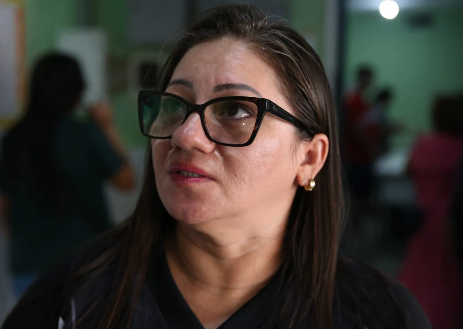 Roberta Pereira viu em telejornal que sua seção eleitoral teve o local alterado para prédio vizinho.